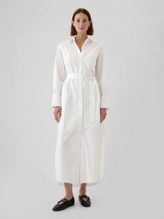 Soft poplin cotton maxi shirtdress.  Point collar, button front.  Long sleeves.  Patch pocket at chest.  Tie belt at waist.  Slant pockets.  Curved hem.  Made with 100% organically grown cotton, which is grown without the use of synthetic pesticides and fertilizers.  * Fit: Classic.  A shift silhouette with a straight & easy fit.  Hits at the ankle.  Models wearing Gap Shirt Dress Outfit, Cotton Long Dress, Cotton Maxi, Fit Inspo, Long Shirt, The Gap, Toddler Gifts, Tie Belt, Fitness Inspo