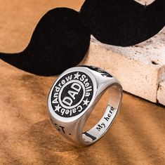 Handmade Signet Rings for Men - This ring makes a wonderful gift for any occasion for the men, fathers, brothers, boyfriends, and husbands in your life. Customizable Ring - You can fill in up to 4 names or dates, and both sides of the ring can be customized. Highest Quality Material - All rings will not fade, tarnish or stain your skin. Durable metal that can stand up to wear and tear. Item specifics: Style Men's Ring Measurements Ring Surface Height: 1.5CM (0.6INCH) Material Copper/ Silver 925 Personalized Adjustable Symbolic Signet Ring, Adjustable Personalized Symbolic Signet Ring, Adjustable Symbolic Personalized Signet Ring, Black Jewelry With Engraving Option For Father's Day, Father's Day Everyday Jewelry With Engraved Text, Personalized Vintage Jewelry For Father's Day, Everyday Engraved Jewelry For Father's Day, Vintage Personalized Jewelry For Father's Day, Father's Day Everyday Engraved Jewelry