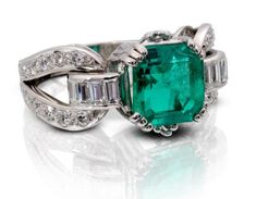 18k White Gold Antique Emerald Cut 3.24ct Emerald (Medium Light/Moderately Strong/Slightly Bluish Green/ SI) and Diamond Ring with 10 Baguette Diamonds = Approximately 0.70ctw and approximately 0.60ctw of 28 round diamonds. Total Ring Weight is 11.4g. Emerald Rings Gold, Colored Diamonds Engagement, Vintage Emerald Rings, Emerald Ring White Gold, Rings With Diamonds, Emerald Ring Vintage, Emerald Ring Gold, Emerald Rings, Ruby Diamond Rings