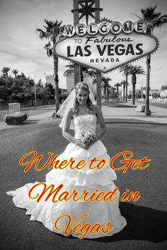 a woman in a wedding dress posing for a photo with the las vegas sign behind her