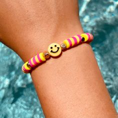 Bracelet handmade by Veronica <3 Cheerful Adjustable Friendship Bracelets As Gift, Pink Bracelet With Colorful Beads, Fun Festival Bracelets, Adjustable, Fun Beaded Bracelets For Friendship, Cheerful Handmade Adjustable Bracelets, Handmade Trendy Yellow Bracelets, Funky Adjustable Bracelets, Handmade Trendy Yellow Friendship Bracelets, Trendy Handmade Yellow Bracelets