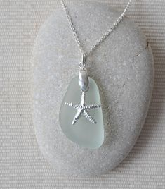 Scottish sea glass and starfish charm sterling silver necklace.  This lovely piece of sea glass was collected by me on a Scottish beach. It is top drilled and fitted with sterling silver bail and sterling silver starfish charm to an 18 inch sterling silver chain. Please let me know if you would like a different chain length - I'd be happy to arrange it at no extra cost. Each piece of sea glass I use in my jewellery is beautifully frosted and carefully selected for the design based on colour, size and shape. They are shaped and frosted by the sea and time only. I pour my heart into the jewellery I make and I hope you will treasure it as much as I treasure creating it. This necklace is packaged in a white organza bag and tissue paper and is ready to be given as a gift. If you require any fur Scottish Beach, Shell Jewellery, Beach Glass Necklace, Sea Glass Pendant, Glass Jewellery, Sea Glass Necklace, Beading Jewelry, Shell Jewelry, Beach Glass