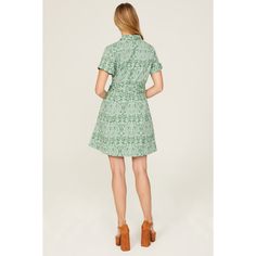 Green jacquard (71% Cotton, 26% Nylon, 3% Elastane). Hourglass. Short sleeves. Collar. Front button closure. 36" from shoulder to hemline. Imported. Spring Jacquard Dresses With Short Sleeves, Green Fitted A-line Shirt Dress, Fitted Green Floral Print Shirt Dress, Fitted Floral Print Shirt Dress For Formal Occasions, Casual Semi-formal Spring Mini Dress, Formal Fitted Shirt Dress With Floral Print, Formal Fitted Floral Print Shirt Dress, Patterned Fitted Dress For Daywear, Fitted Patterned Dress For Daywear