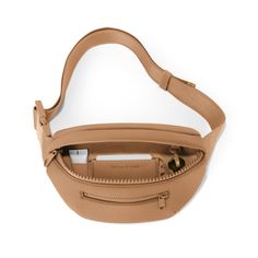 Whether you're an avid explorer or just like to keep things hands-free on the regs, The Ace Fanny Pack in Camel is your perfect companion. This waterproof neoprene pack has an adjustable strap, so you can decide how high or low your wearing style wants to go. The front and main pockets are perfect for everyday must-carry items, and there are two sneaky pockets (one interior, one exterior) great for keeping your cash and cards and other flat valuables safe and snug. This pack even has its own key Neutral Bag, Neoprene Bag, Dagne Dover, Parenting Organization, Travel Crib, Baby Changing Pad, Itzy Ritzy, Convertible Car Seat, Booster Car Seat