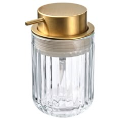 an empty glass jar with a gold lid