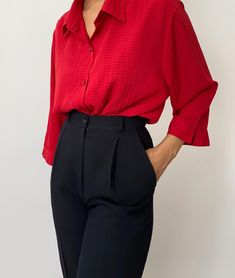 "Vintage red button-up with built-in shirt. In great condition, minimal wear. Measurements: Size: 1X Shoulder to shoulder: 17.5\" Bust: 24.5\" Length: 30\" Sleeve: 17\" Material: 100% Polyester Vintage and pre-loved items are one of a kind and may have minor imperfections. The color of the item may vary slightly due to lighting. The model in the photos wears a size XS/S and is 5'3\". We cannot be certain that an item will fit you. Please refer to the measurements. All Sales Final" Red Button Up Outfit, Red Buttoned Shirt For Work, Red Button-up Shirt For Office, Red Relaxed Fit Blouse For Work, Red Office Shirt With Button Closure, Red Relaxed Fit Shirt For Work, Classic Red Workwear Top, Red Button-up Top For Business Casual, Red Tops For Business Casual Spring