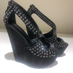 Black Bedazzled Wedge Never Worn Very Cute On Just Never Had Anywhere To Wear Them To. Shipped Without Box Chic High Heel Wedge Sandals With Rhinestones, Chic Rhinestone High Heel Wedge Sandals, Spiked Open Toe Wedge Sandals, Black Wedge Sandals With Rhinestones For Summer, Black Rhinestone Wedge Sandals For Summer, Party Wedge Heel Sandals With Rhinestones, Party Wedge Sandals With Rhinestones, Black Synthetic Wedge Sandals With Rhinestones, Wedge Heel Sandals For Night Out