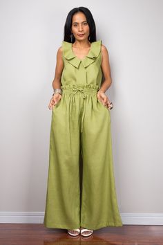 "Green Linen trousers, Handmade long wide leg palazzo pants with pockets. Green high waist women's summer linen pants, natural linen pants Made with the highest care this beautifully crafted high waist women's summer pants will fit you perfect thanks to the elastic strap on the waist and the added drawstring. I like wearing this one when sitting in the garden reading a book and dream away. Soul of the Orient Collection - Original Design & Produced by NUICHAN PRODUCT SIZE : * Waist : elastic Green Linen Trousers, Natural Linen Pants, Summer Linen Pants, Kaftan Top, Summer Pants Women, Wide Leg Palazzo Pants, Summer Linen, Pants With Pockets, Summer Pants