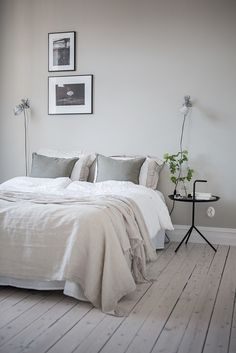 two pictures of a bedroom with white walls and wood floors, one has a bed