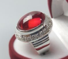 Mens Quality Cabochon Red Ruby Sterling Silver 925 Handmade Ring Product Type: Ring Ring Size: 5 US, 6 US, 7 US, 8 US, 9 US, 10 US, 11 US, 12 US, 13 US, 14 US, 15 US, 16 US Stone Type: Ruby, Yaqoot, Rubin, Yaqut, Rubis, Roby, Yakoot, Anari Yaqoot Metal Type: Sterling Silver 925 Main Stone: Ruby Main Stone Color: Red Handmade: Yes, Artisan Ring Type: Heated & Treated (Lab Created) This Sterling Silver Ring is a perfect gift for men and women. The ring showcases an elegant design with unique Ruby Red Cabochon Ring Jewelry, Red Oval Cabochon Ring With Polished Finish, Fine Jewelry Red Cabochon Ruby Ring, Red Oval Cabochon Ruby Ring For Gift, Red Cabochon Ring In Fine Jewelry Style, Polished Red Ruby Ring, Red Cabochon Ring Fine Jewelry, Red Cabochon Rings Fine Jewelry, Red Ruby Rings In Oval Cabochon Shape