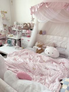 a bedroom with pink bedding and teddy bears on the walls, white furniture and curtains