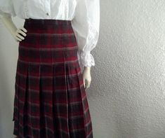 70s retro tartan skirt, spring pleated skirt, brown burgundy skirt, plaid elegant skirt, handmade paddleton skirt, preppy british college skirt, don't have lining, the fabric could be wool, but I cannot be sure about that.  the skirt is a little bit larger than apear on the photos because is adjusted to fit on the mannequin. measurements laying flat : waist:45cm (17,5 inches) hips :55 cm (21,5 inches) total lenght:66 cm (26 inches) Fall School Uniform Lined Skirt, Vintage Full Pleated Skirt For Fall, Fall School Uniform Style Pleated Skirt, School Uniform Style Pleated Skirt For Fall, Scottish Style Fitted Pleated Skirt For Fall, Vintage Pleated Skirt For Fall, Fitted Full Skirt In Plaid, Vintage Accordion Pleats Skirt For Fall, Fitted Plaid Pleated Skirt For School Uniform