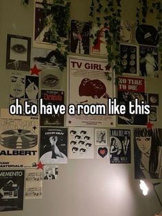 there is a wall with posters on it and the words oh to have a room like this