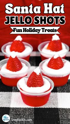 some red cups with strawberries in them and the words sanito hot jello shots fun holiday treats