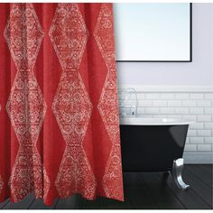 a red shower curtain in a bathroom with a black bathtub and white tiled walls