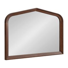 a wooden mirror frame with an arched design on the top and bottom half, in dark brown