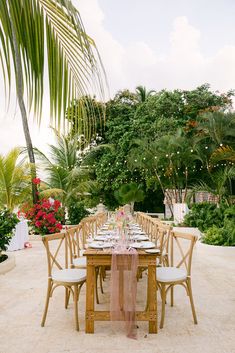 a table set up for an outdoor dinner