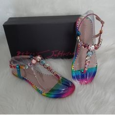 Betsey Johnson Bling Sandals Pink Jelly Sandals With Ankle Strap For Party, Pink Ankle Strap Jelly Sandals For Party, Rainbow Round Toe Sandals For Party, Rainbow Sandals With Round Toe For Party, Multicolor Flat Sandals For Parties, Adjustable Ankle Strap Jelly Sandals For Party, Spring Party T-strap Sandals With Flat Heel, Multicolor Flat Jelly Sandals For Summer, Flat Heel T-strap Sandals For Party And Spring