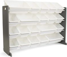 a large white shelf with many bins on it