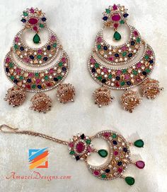 American Diamond (AD) Multicolored Earrings Tikka with small Jhumkis on the bottom. Available to shop online and delivered to your doorsteps anywhere in the world with our Everything-Everywhere FREE Shipping. 📦Unmatched FREE Worldwide Shipping EXPLORE more Maang Tikka Sets and Tikka Set Punjabi AMERICAN DIAMOND JEWELLERY Match with our pretty Single Line Necklaces Jaspreet, Canada ⭐️⭐️⭐️⭐️⭐️ Jewellery is more beautiful in real than the picture. Also, I received order within two days. I like the Multicolor Fusion Style Festive Jhumkas, Festive Multicolor Fusion Style Jhumkas, Multicolor Chandbali Earrings For Eid, Multicolor Fusion Jhumkas For Diwali, Fusion Style Multicolor Jhumkas For Diwali, Multicolor Latkans Earrings For Eid, Fusion Style Multicolor Chandbalis, Multicolor Chandbali Jhumkas With Tilla, Multicolor Jhumkas With Matching Earrings For Diwali