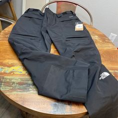 Black North Face Ski Pants. Dryvent Fabric That Is Waterproof, Wind Proof And Breathable. Adjustable Velcro Waist Four Large Front Zippered Pockets And One Back Zippered Pocket. Inner-Thigh Vents. North Face Ski Pants, North Face Ski, North Face Hyvent, The North Face Pants, Tan Face, North Face Pants, Nylon Pants, Lightweight Pants, Snowboard Pants