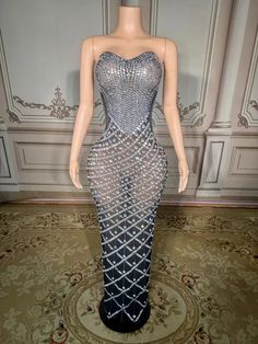 a mannequin wearing a dress made out of diamonds