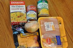 an assortment of food on a wooden table