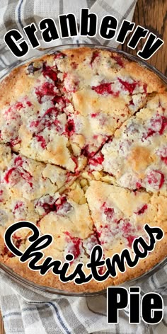 a close up of a pie on a table with the words cranberry christmas pie