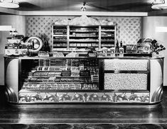 an old photo of a deli counter in a store