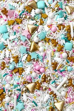 sprinkles, confetti, and candy are mixed together