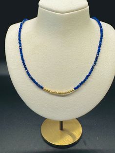 I love deep blues with gold and this necklace is stunning! 17 inches in length but can have a 2 inch extender chain Adjustable Blue Jewelry With Gold Beads, Gold Single Strand Lapis Lazuli Beaded Necklace, Gold Lapis Lazuli Spiritual Necklace, Elegant Gold Beaded Necklaces With Lapis Lazuli, Adjustable Single Strand Sapphire Necklace, Gold Lapis Lazuli Faceted Beads Necklace, Beaded Sapphire Necklace In Lapis Lazuli, Gold Lapis Lazuli Necklace With Faceted Beads, Sapphire Beaded Lapis Lazuli Necklace