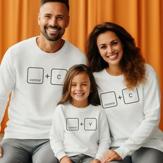 "Get ready to match in style with our Control C Control V Sweatshirt! Perfect for Father's Day or any day, these Family Matching Hoodies bring humor and unity. Embrace the fun with our Funny Family Matching design, available in sizes for Daddy and Me. Stay cozy and coordinated with this Ctrl C Ctrl V Sweater!" Welcome to NIOBE BOUTIQUE. I am happy to see you in my shop. My main purpose is to meet you with a high-quality product. I use the best product to make you happy. Your satisfaction is my p White Long Sleeve Matching T-shirt, Funny Long Sleeve Cotton Hoodie, Family Matching Long Sleeve Cotton Sweatshirt, Matching Cotton Sweatshirt For Fall, Funny White Long Sleeve Tops, Cotton Fall Sweatshirt, Funny Cotton Sweatshirt For Winter, Funny Cotton Long Sleeve Sweater, Funny Cotton Winter Sweatshirt