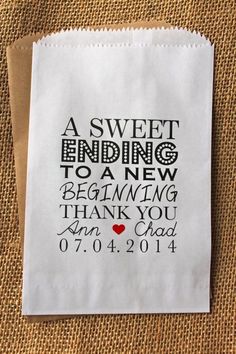 a paper bag with the words, a sweet ending to a new beginning thank you