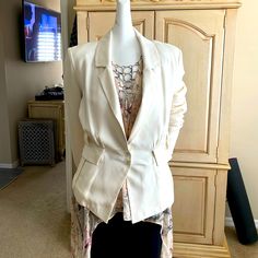 Madison Marcus Ivory Silk Blazer Jacket Never Worn Excellent Condition Not Sold With Belt And Actual Belt Is Missing Price Reflects This Fact Please See Pictures For All The Details This Jacket Has So Many Bells And Whistles. It’s Just Really Fun And Cute. Great For The Office Drinks Afterwards Running Errands. I Bought This Jacket At Bloomingdale’s In Sherman Oaks California. It Has Hung In My Closet Ever Since Shortly After Buying It I Had My Fifth Back Surgery And After I Was Told I Could Not Feminine Beige Outerwear For Work, Elegant Off White Outerwear For Spring, Chic Cream Blazer For Fall, Chic Off-white Fall Blazer, Fitted Neutral Blazer For Spring, Chic Off White Fall Blazer, Chic Off White Blazer For Fall, Elegant Off-white Workwear Blazer, Elegant Off-white Blazer For Work