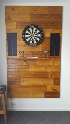 a dart board mounted to the side of a wall