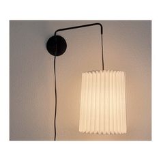 a lamp that is hanging on the wall