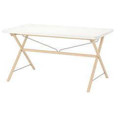 a white table with wooden legs on a white background