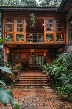 a house that is surrounded by trees and plants