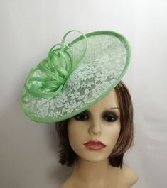 Hatinator/Fascinator in Apple green sinamay. I have hand sculptured this fascinator/hatinator and overlayed the brim with mint green lace, it is trimmed with sinamay loops. It is secured with a fine covered headband which can easily be hidden by your hair if desired. One size fits all Spring Church Fascinator In Sinamay, Spring Church Sinamay Fascinator, Green Summer Headpieces For Party, Green Mini Hat With Short Brim For Summer, Green Summer Party Headpiece, Green Short Brim Mini Hat For Summer, Green Short Brim Fascinator For Evening, Green Evening Fascinator Hat, Spring Green Fascinator For Races