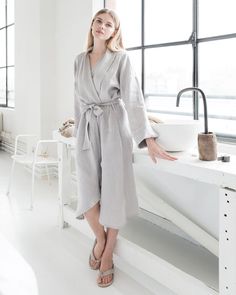 Relax and unwind in a comfortable, soft linen robe. Designed to have a loose fit, it can be cinched at the waist with a tie. Long sleeves can be rolled up to form ¾ sleeves. Highly breathable and absorbent, it’s an irreplaceable bath accessory. • Medium weight linen (approx. 200 gsm) Please note that due to the many variations in monitors and browsers, actual colors may vary. • Features two side pockets and a waist tie• Made from 100% European flax• Stone washed for maximum softness Womens Robe, Linen Bathrobe, Review Clothing, Wrinkled Clothes, Linen Robe, Linen Pajamas, Linen Loungewear, Fresh Linen, Gift For Woman