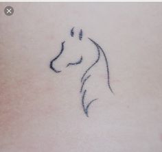 a horse's head is drawn on the back of a woman's stomach