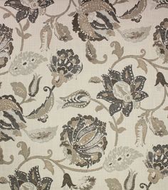 a close up view of a flowery pattern on a white fabric with black and brown accents