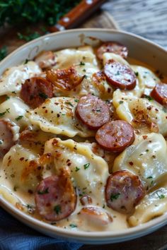 a white bowl filled with pasta covered in cheese and pepperoni toppings on top of a wooden table