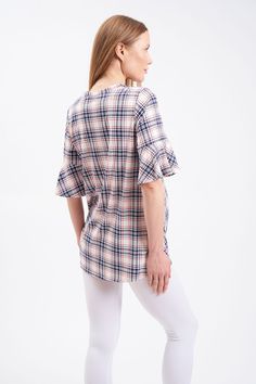 Plaid, loose-fitting blouse with a crewneck. This darling maternity shirt gives you room to grow without leaving you feeling frumpy. The front knot detail creates a sweet silhouette as you show off your growing baby bump. Whether you're headed out to dinner or to the park with the little ones, this maternity blouse will dress your baby bump in style and confidence. Short bell sleeves Front knot Hi-low hem For Hot Mommy during pregnancy and beyond Fabric: 96% Polyester, 4% Spandex Packaged and sh Maternity Blouses, Fitted Nursing-friendly Maternity Tops, Hot Mommy, Maternity Blouse, Plaid Tunic, Plaid Long-sleeve Top With Button Closure, Pregnancy Shirts, Bell Sleeves, Spandex