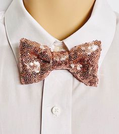 -Rose Gold Sequin bow tie, Rose Gold glitter bow tie, Rose Gold Pocket Square, Rose Gold Kid bow tie, Color Sequin bow tie,Hand made-  Rose gold sequin bow tie for adults, boys, toddlers.Toddler bow tie has a clip style. Adult, Kids Bow Neck Strap is a 5/8 "elastic band.  * The Pre-Tied Bow Tie- Bow Tie elastic neck strap - OPTION-      *Ad Bow NeckStrap+ PS: Adult bow neck strap + pocket square .Band size:14" -21"   * Adult Bow Tie C only : Adult bow tie with clip   *Kids Bow Tie only: Neck str Adjustable Pink Bow For Party, Pink Party Bow With Bow Tie Back, Pink Bow Tie As A Gift, Pink Satin Bow Tie For Party, Gold Pocket Square, Sequin Bow Tie, Gold Glitter Bow, Toddler Bow Ties, Tied Hands