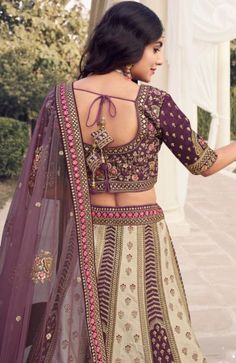 premium quality Silk fabric. Embroidered with intricate motifs worked beautifully with resham, sequin, zari, & stones. Highlighted with embroidered side tassels & waist belt. Teamed with complimenting, embroidered Velvet Blouse. Completed with embroidered as well as bordered Net Dupatta. Luxury Purple Lehenga With Motifs, Traditional Embroidered Purple Lehenga, Luxury Embroidered Purple Choli, Festive Purple Embroidered Lehenga, Luxury Purple Floral Embroidered Lehenga, Velvet Blouses, Bridal Lehenga Choli, Net Dupatta, Bridal Lehenga