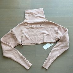 Never Worn Athletic Crop Sweater. Size Xs. Retail $160. Splice Long Sleeve Crop Alo Yoga Fitted Tops For Fall, Fitted Alo Yoga Top For Fall, Alo Yoga Fitted Tops For Winter, Alo Yoga Cropped Tops For Fall, Spring Fitted Alo Yoga Tops, Alo Yoga Fitted Cropped Tops, Chic Fitted Alo Yoga Top, Chic Alo Yoga Tops For Spring, Alo Pink