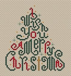 a cross stitch christmas tree with the words merry