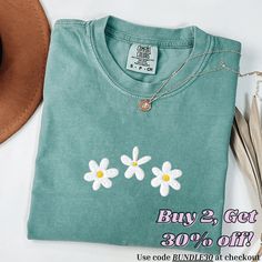 Comfort Colors Daisy Shirt, Embroidered Comfort Colors Shirt, Embroidered Flower Shirt, Daisies T-Shirt, Embroidered Daisies, Spring Shirt This embroidered daisies comfort colors shirt is everything. Perfect to wear for springtime! ✨ 100% Cotton ✨ Pre-shrunk ✨ Relaxed fit Care: Machine wash: warm (max 40C or 105F) Tumble dry: low Do not iron directly on the print REFUNDS AND EXCHANGES All items are made to order using multiple suppliers to ensure quick worldwide shipping. For this reason we are unable to accept returns/exchanges unless there's a defect in the item you've received. Thank you so much for shopping! Please send me a message if you have any questions, concerns or custom requests. Sisterhood Round, Embroidered Daisies, Daisy Shirt, Embroidery Men, Comfort Colors Shirt, Mens Long Sleeve Tee, Flower Shirt, Spring Shirts, Embroidered Shirt