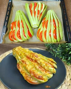 there are some vegetables on the plate and one is cut up to look like they have been cooked